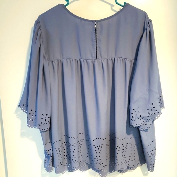 BLUE SHORT SLEEVE TOP WITH LASER CUTOUTS - Picture 2 of 6